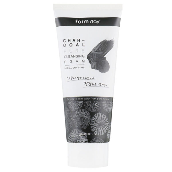 A tube of farmstay charcoal pure cleansing foam for all skin types, featuring an illustration of charcoal and plant elements, emphasizing its natural ingredients.